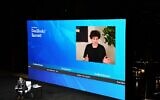 Andrew Ross Sorkin, bottom left, speaks by video with FTX founder Sam Bankman-Fried during the New York Times DealBook Summit in the Appel Room at the Jazz At Lincoln Center on November 30, 2022 in New York City. (Michael M. Santiago/ Getty Images via AFP)