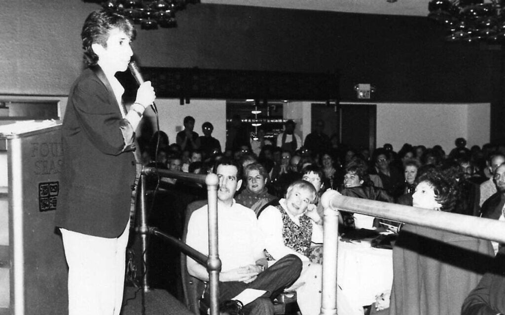 Lisa Geduldig onstage at the first annual Kung Pao Kosher Comedy show in San Francisco in 1993. (Courtesy of Lisa Geduldig via JTA) Lisa Geduldig onstage at the first annual Kung Pao Kosher Comedy show in San Francisco in 1993. (Courtesy of Lisa Geduldig via JTA)