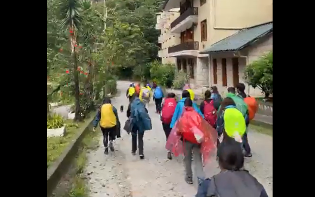 Israelis evacuating on foot from Aguas Calientes, amid deadly protests in Peru, December 17, 2022. (Facebook video screenshot: used in accordance with Clause 27a of the Copyright Law) Israelis evacuating on foot from Aguas Calientes, amid deadly protests in Peru, December 17, 2022. (Facebook video screenshot: used in accordance with Clause 27a of the Copyright Law)