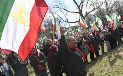 Supporters of the Iranian resistance and the main opposition Mojahedin-e Khalq (MeK) rally in Lafayette Park near the White House in Washington, February 8, 2020. (AP Photo/Susan Walsh)