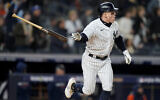 New York Yankees Harrison Bader tosses his bat after hitting a solo home run against the Houston Astros during the sixth inning of Game 4 of an American League Championship baseball series, Sunday, Oct. 23, 2022, in New York. (AP Photo/John Minchillo)