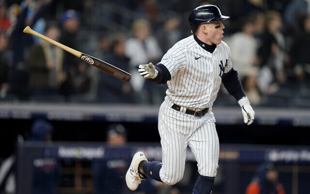 New York Yankees Harrison Bader tosses his bat after hitting a solo home run against the Houston Astros during the sixth inning of Game 4 of an American League Championship baseball series, Sunday, Oct. 23, 2022, in New York. (AP Photo/John Minchillo) New York Yankees Harrison Bader tosses his bat after hitting a solo home run against the Houston Astros during the sixth inning of Game 4 of an American League Championship baseball series, Sunday, Oct. 23, 2022, in New York. (AP Photo/John Minchillo)