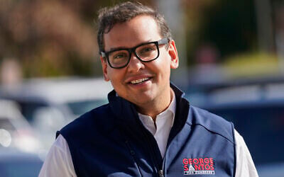 Then-Republican candidate George Santos for New York's 3rd Congressional District campaigns outside a Stop and Shop store, November 5, 2022, in Glen Cove, New York. (AP/Mary Altaffer) Then-Republican candidate George Santos for New York's 3rd Congressional District campaigns outside a Stop and Shop store, November 5, 2022, in Glen Cove, New York. (AP/Mary Altaffer)