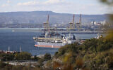 An oil tanker is moored at the Sheskharis complex, part of Chernomortransneft JSC, a subsidiary of Transneft PJSC, in Novorossiysk, Russia, October 11, 2022, one of the largest facilities for oil and petroleum products in southern Russia. (AP Photo, File)