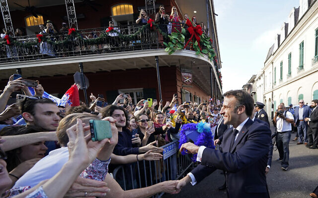 French President Emmanuel Macron greets the crowd in New Orleans, Dec. 2, 2022. (AP Photo/Gerald Herbert) French President Emmanuel Macron greets the crowd in New Orleans, Dec. 2, 2022. (AP Photo/Gerald Herbert)
