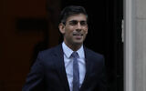 Britain's Prime Minister Rishi Sunak departs 10 Downing Street in London, Dec. 7, 2022. (AP Photo/Alastair Grant)