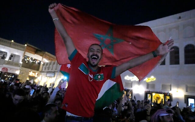 People celebrate in the Souq in Doha, Qatar after Morocco beat Portugal in a World Cup quarterfinal soccer match at Al Thumama Stadium in Doha, Qatar, December 10, 2022. (AP Photo/Jorge Saenz) People celebrate in the Souq in Doha, Qatar after Morocco beat Portugal in a World Cup quarterfinal soccer match at Al Thumama Stadium in Doha, Qatar, December 10, 2022. (AP Photo/Jorge Saenz)