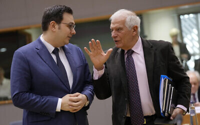 European Union foreign policy chief Josep Borrell, right, speaks with Czech Republic's Foreign Minister Jan Lipavsky at a meeting of EU foreign ministers at the European Council building in Brussels, December 12, 2022. (AP Photo/Virginia Mayo)