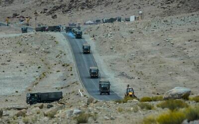Indian army vehicles move in a convoy in the cold desert region of Ladakh, India, Sept. 20, 2022. Nestled between India, Pakistan and China, Ladakh has not just faced territorial disputes but also stark climate change. (AP Photo/Mukhtar Khan) Indian army vehicles move in a convoy in the cold desert region of Ladakh, India, Sept. 20, 2022. Nestled between India, Pakistan and China, Ladakh has not just faced territorial disputes but also stark climate change. (AP Photo/Mukhtar Khan)
