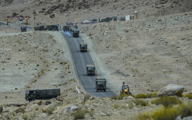 Indian army vehicles move in a convoy in the cold desert region of Ladakh, India, Sept. 20, 2022. Nestled between India, Pakistan and China, Ladakh has not just faced territorial disputes but also stark climate change. (AP Photo/Mukhtar Khan) Indian army vehicles move in a convoy in the cold desert region of Ladakh, India, Sept. 20, 2022. Nestled between India, Pakistan and China, Ladakh has not just faced territorial disputes but also stark climate change. (AP Photo/Mukhtar Khan)
