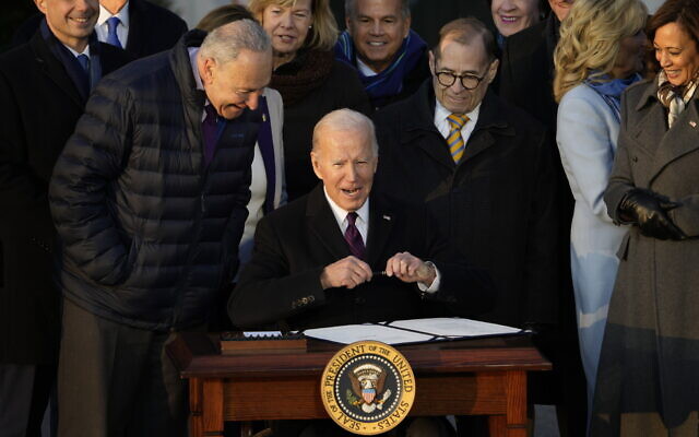 US President Joe Biden signs the Respect for Marriage Act, December 13, 2022, on the South Lawn of the White House in Washington. (AP Photo/Andrew Harnik) US President Joe Biden signs the Respect for Marriage Act, December 13, 2022, on the South Lawn of the White House in Washington. (AP Photo/Andrew Harnik)