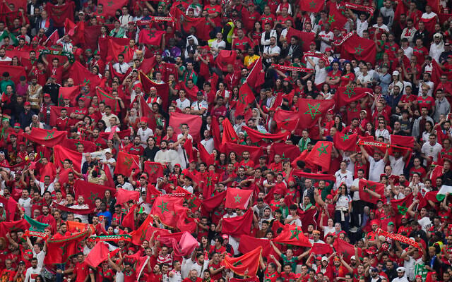 Moroccan fans cheer during the World Cup semifinal soccer match between France and Morocco at the Al Bayt Stadium in Al Khor, Qatar, December 14, 2022. (AP Photo/Hassan Ammar) Moroccan fans cheer during the World Cup semifinal soccer match between France and Morocco at the Al Bayt Stadium in Al Khor, Qatar, December 14, 2022. (AP Photo/Hassan Ammar)