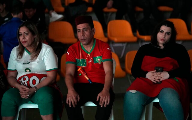 Dejected Morocco fans watch a live broadcast of the World Cup semifinal soccer match between Morocco and France played in Qatar, in the southern Israeli port city of Ashdod, December 14, 2022. (AP Photo/ Tsafrir Abayov) Dejected Morocco fans watch a live broadcast of the World Cup semifinal soccer match between Morocco and France played in Qatar, in the southern Israeli port city of Ashdod, December 14, 2022. (AP Photo/ Tsafrir Abayov)