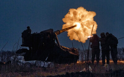 Ukrainian soldiers fire a Pion artillery system at Russian positions near Bakhmut, Donetsk region, Ukraine, December 15, 2022. (AP Photo/LIBKOS)