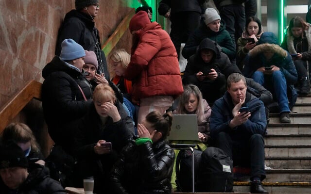 People take cover in the subway station being used as a bomb shelter during a rocket attack in Kyiv, Ukraine, December 16, 2022. (AP/Efrem Lukatsky) People take cover in the subway station being used as a bomb shelter during a rocket attack in Kyiv, Ukraine, December 16, 2022. (AP/Efrem Lukatsky)