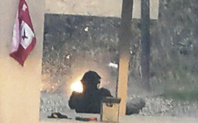 This photo taken November 11, 2022, by the FBI in an affidavit filed to the United State District Court of Minnesota shows River William Smith at a gun club in Prior Lake, Minnesota. (FBI via AP) This photo taken November 11, 2022, by the FBI in an affidavit filed to the United State District Court of Minnesota shows River William Smith at a gun club in Prior Lake, Minnesota. (FBI via AP)