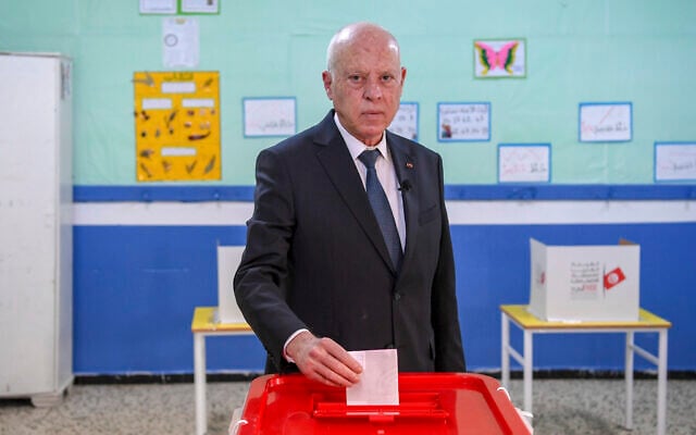 Tunisia's President Kais Saied casts his ballot as he participates in the legislative elections in Tunis, December 17, 2022. (AP/Slim Abid) Tunisia's President Kais Saied casts his ballot as he participates in the legislative elections in Tunis, December 17, 2022. (AP/Slim Abid)
