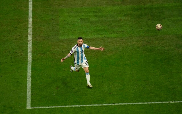 Argentina's Lionel Messi celebrates after scoring his side's opening goal during the World Cup final soccer match between Argentina and France at the Lusail Stadium in Lusail, Qatar, December 18, 2022. (AP Photo/Francisco Seco)