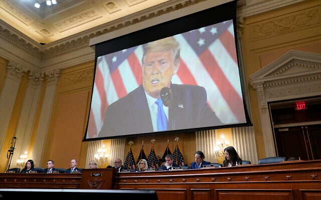 A video of former President Donald Trump is shown on a screen, as the House select committee investigating the January 6 attack on the US Capitol holds its final meeting on Capitol Hill in Washington, December 19, 2022. (AP Photo/J. Scott Applewhite) A video of former President Donald Trump is shown on a screen, as the House select committee investigating the January 6 attack on the US Capitol holds its final meeting on Capitol Hill in Washington, December 19, 2022. (AP Photo/J. Scott Applewhite)