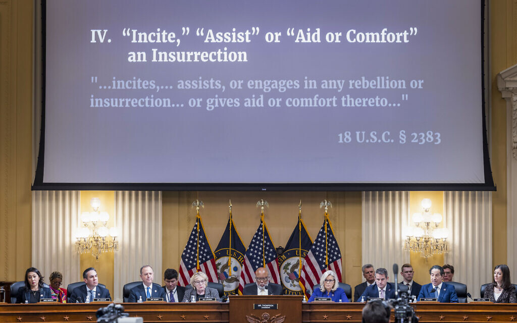 An image with information about the criminal referral of former US President Donald Trump to the Department of Justice is displayed as the House select committee investigating the Jan. 6 attack on the US Capitol holds its final meeting on Capitol Hill in Washington, Dec. 19, 2022. (Jim Lo Scalzo/Pool Photo via AP) An image with information about the criminal referral of former US President Donald Trump to the Department of Justice is displayed as the House select committee investigating the Jan. 6 attack on the US Capitol holds its final meeting on Capitol Hill in Washington, Dec. 19, 2022. (Jim Lo Scalzo/Pool Photo via AP)