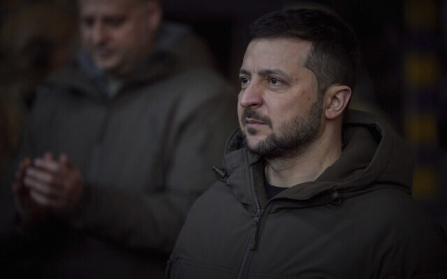 In this photo provided by the Ukrainian Presidential Press Office, Ukrainian President Volodymyr Zelensky looks on as he meets soldiers at the site of the heaviest battles with the Russian invaders in Bakhmut, Ukraine, December 20, 2022. (Ukrainian Presidential Press Office via AP) In this photo provided by the Ukrainian Presidential Press Office, Ukrainian President Volodymyr Zelensky looks on as he meets soldiers at the site of the heaviest battles with the Russian invaders in Bakhmut, Ukraine, December 20, 2022. (Ukrainian Presidential Press Office via AP)