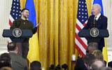 US President Joe Biden and Ukrainian President Volodymyr Zelensky hold a news conference in the East Room of the White House in Washington, Dec. 21, 2022. (AP Photo/Andrew Harnik)