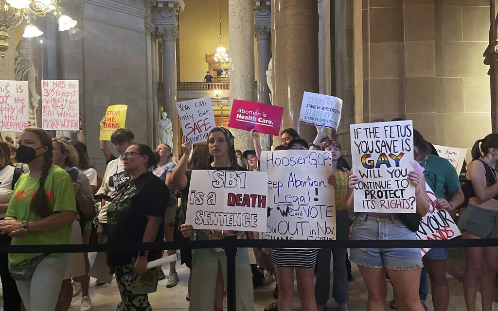 Abortion-rights protesters fill Indiana Statehouse corridors as lawmakers voted to concur on a near-total abortion ban, in Indianapolis August 5, 2022. (Arleigh Rodgers/AP) Abortion-rights protesters fill Indiana Statehouse corridors as lawmakers voted to concur on a near-total abortion ban, in Indianapolis August 5, 2022. (Arleigh Rodgers/AP)