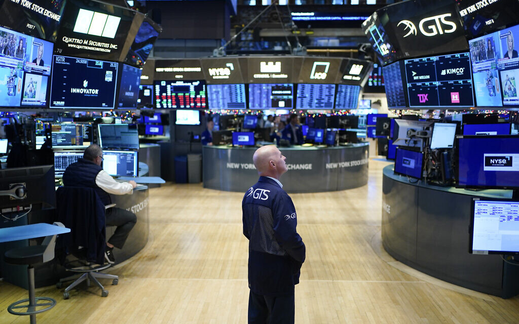 Traders work on the floor at the New York Stock Exchange in New York, December 29, 2022. (AP Photo/Seth Wenig) Traders work on the floor at the New York Stock Exchange in New York, December 29, 2022. (AP Photo/Seth Wenig)
