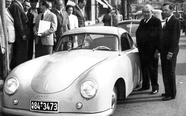Austrian-German entrepreneur and car designer Ferdinand Porsche Jr., right, stands with his father Ferdinand beside a Porsche sports car in this June 10, 1950 picture. (AP Photo) Austrian-German entrepreneur and car designer Ferdinand Porsche Jr., right, stands with his father Ferdinand beside a Porsche sports car in this June 10, 1950 picture. (AP Photo)