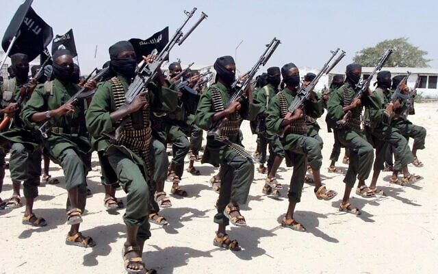 Hundreds of newly trained al-Shabaab fighters perform military exercises in the Lafofe area some 18 kilometers south of Mogadishu, Somalia. (AP Photo/Farah Abdi Warsameh) Hundreds of newly trained al-Shabaab fighters perform military exercises in the Lafofe area some 18 kilometers south of Mogadishu, Somalia. (AP Photo/Farah Abdi Warsameh)