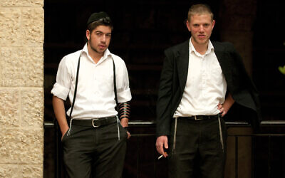 18-year-old Jewish Orthodox students take a break in the Jewish Quarter of the Old City of Jerusalem. May 18, 2011. (Hadas Parush/Flash90)