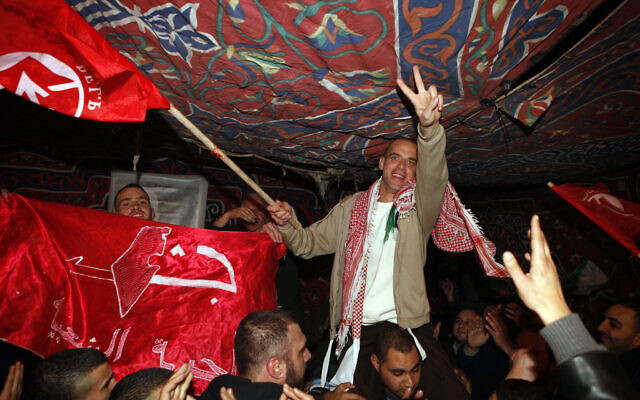 Salah Hamouri is greeted after arriving at his home in Jerusalem following his released from Israeli prison in a prisoner exchange deal with Hamas, Dec. 18 2011. (Sliman Khader/FLASH90) Salah Hamouri is greeted after arriving at his home in Jerusalem following his released from Israeli prison in a prisoner exchange deal with Hamas, Dec. 18 2011. (Sliman Khader/FLASH90)