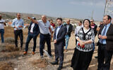 Religious Zionism party chief Bezalel Smotrich (center) and party members at the settlement of Efrat in the Gush Etzion region of the West Bank, October 26, 2022. (Gershon Elinson/Flash90)