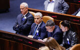 Sitting from left to right: Outgoing Defense Minister Benny Gantz, outgoing Prime Minister Yair Lapid, outgoing Justice Minister Gideon Sa'ar, and outgoing Transportation Minister Merav Michaeli, at the swearing-in ceremony of the 25th Knesset, in Jerusalem, November 15, 2022. (Olivier Fitoussi/Flash90)