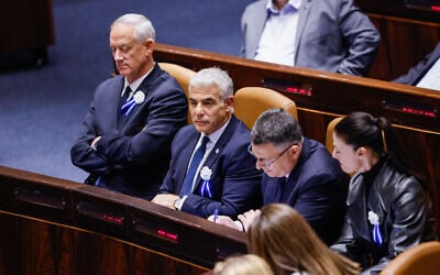 Sitting from left to right: Outgoing Defense Minister Benny Gantz, outgoing Prime Minister Yair Lapid, outgoing Justice Minister Gideon Sa'ar, and outgoing Transportation Minister Merav Michaeli, at the swearing-in ceremony of the 25th Knesset, in Jerusalem, November 15, 2022. (Olivier Fitoussi/Flash90)