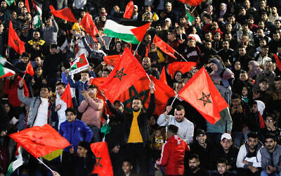 Palestinians watch the Qatar 2022 World Cup quarterfinal game between Morocco and Portugal, in Nablus, in the West Bank, on December 10, 2022 (Nasser Ishtayeh/Flash90)