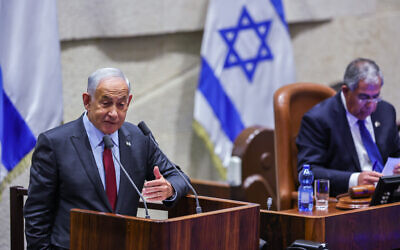 Presumed incoming prime minister Benjamin Netanyahu addresses the Knesset on December 13, 2022. (Yonatan Sindel/Flash90)