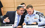 Itamar Ben Gvir, left, and Police chief Kobi Shabtai attend a meeting at the Knesset in Jerusalem, on December 14, 2022. (Yonatan Sindel/Flash90)