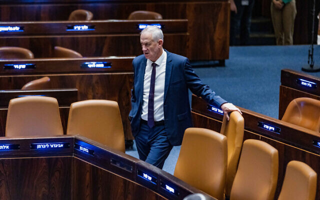 Defense Minister Benny Gantz attends a vote during a plenum session at the Knesset on December 15, 2022 (Olivier Fitoussi/Flash90)