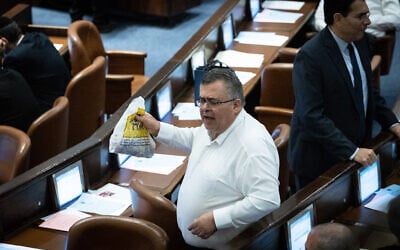 Likud MK David Bitan seen during a vote in a Knesset plenum session in Jerusalem, December 20, 2022. (Yonatan Sindel/Flash90)