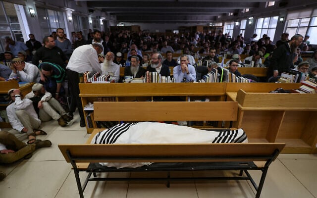 Former and current students attend the funeral of Rabbi Chaim Druckman in Merkaz Shapira in central Israel on December 26, 2022. (Yonatan Sindel/Flash90) Former and current students attend the funeral of Rabbi Chaim Druckman in Merkaz Shapira in central Israel on December 26, 2022. (Yonatan Sindel/Flash90)