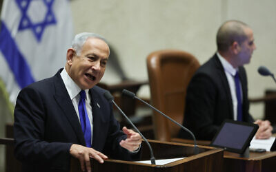 Incoming prime minister Benjamin Netanyahu presents his new government to the Knesset in Jerusalem on December 29, 2022 (Yonatan Sindel/FLASH90)