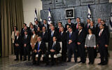 Members of the new Israeli government, headed by Prime Minister Benjamin Netanyahu, pose for a group photo at the President's Residence in Jerusalem, on December 29, 2022. (Yonatan Sindel/Flash90)