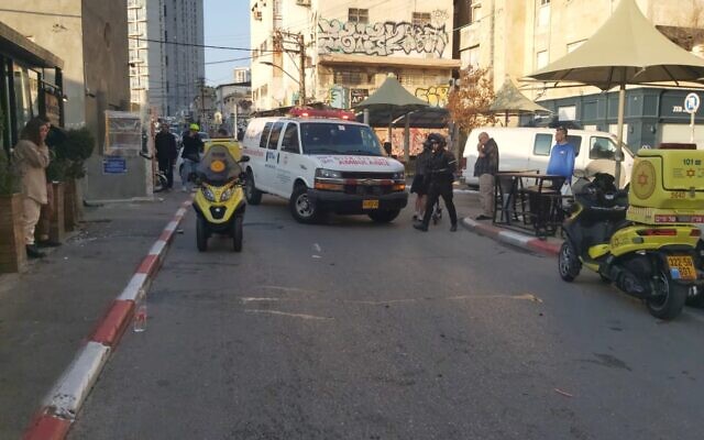 Police and medics at the scene of a suspected car-ramming attack in Tel Aviv, December 8, 2022 (Magen David Adom) Police and medics at the scene of a suspected car-ramming attack in Tel Aviv, December 8, 2022 (Magen David Adom)