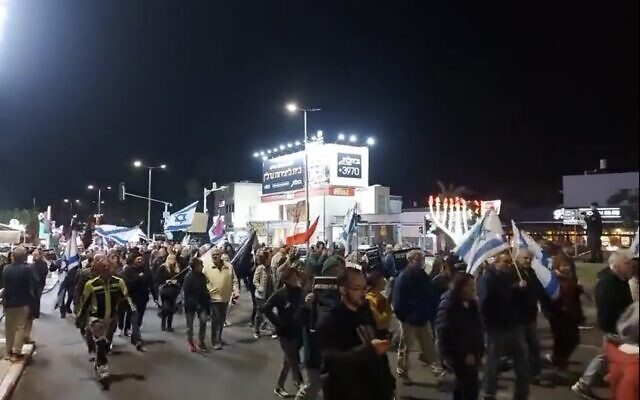 Screen capture from video of a demonstration in Haifa against the emerging government, December 24, 2022. (Twitter. Used in accordance with Clause 27a of the Copyright Law) Screen capture from video of a demonstration in Haifa against the emerging government, December 24, 2022. (Twitter. Used in accordance with Clause 27a of the Copyright Law)