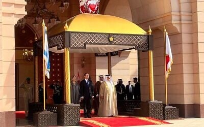 President Isaac Herzog (front L) and King Hamad bin Isa Al Khalifa (front R) at the Al Qudaibiya palace in Manama, December 4, 2022. (Lazar Berman/Times of Israel) President Isaac Herzog (front L) and King Hamad bin Isa Al Khalifa (front R) at the Al Qudaibiya palace in Manama, December 4, 2022. (Lazar Berman/Times of Israel)