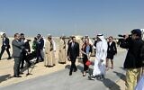 President Isaac Herzog lands in Abu Dhabi, where he is greeted by UAE Foreign Minister Abdullah Bin Zayed, December 5, 2022. (Lazar Berman/Times of Israel)