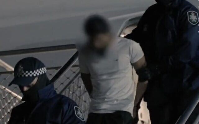 Screen capture from video of Neil Christopher Prakash, an Islamic State suspected member, who was extradited from Turkey, seen arriving in Melbourne, December 4, 2022. (Twitter. Used in accordance with Clause 27a of the Copyright Law) Screen capture from video of Neil Christopher Prakash, an Islamic State suspected member, who was extradited from Turkey, seen arriving in Melbourne, December 4, 2022. (Twitter. Used in accordance with Clause 27a of the Copyright Law)