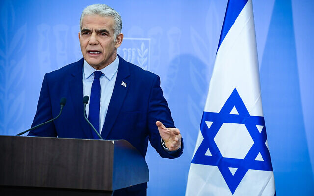 Outgoing Prime Minister Yair Lapid holds a press conference in Tel Aviv on December 22, 2022. (Tomer Neuberg/Flash90) Outgoing Prime Minister Yair Lapid holds a press conference in Tel Aviv on December 22, 2022. (Tomer Neuberg/Flash90)