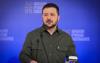 Ukrainian President Volodymyr Zelensky attend a news conference in Kyiv, Ukraine, November 26, 2022. (AP Photo/Efrem Lukatsky)
